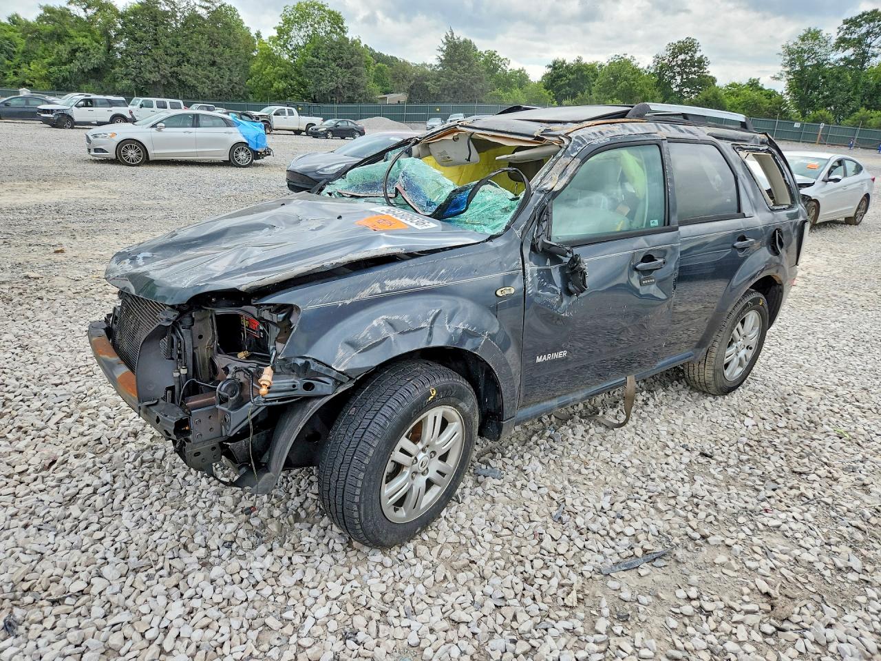 2008 Mercury Mariner Premier, VIN 4M2CU97188KJ41865 — Rollover