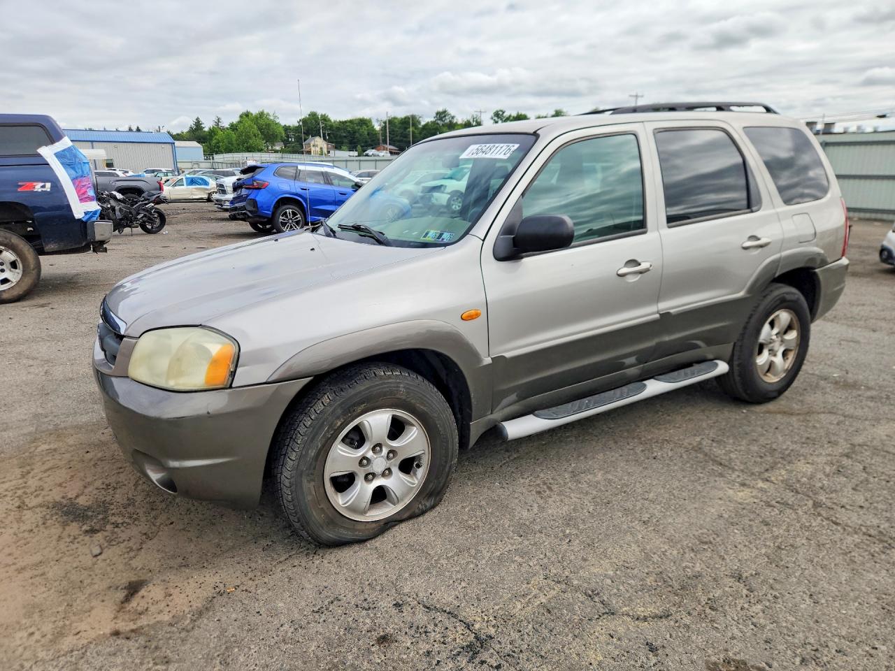 2002 Mazda Tribute LX, VIN 4F2CU081X2KM55735 — Перед