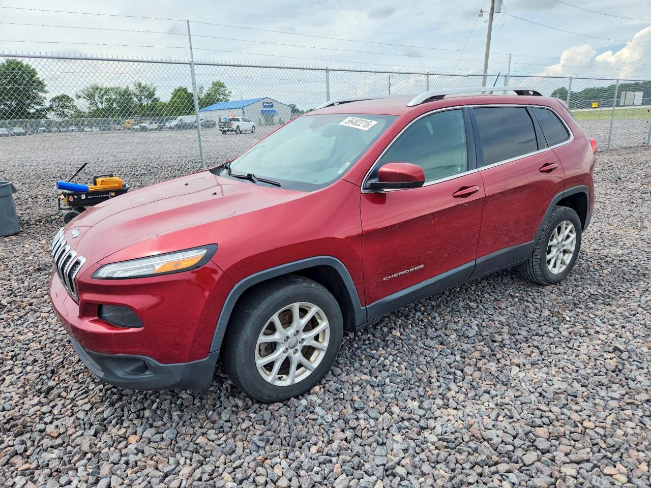 2015 Jeep Cherokee Latitude, VIN 1C4PJLCB3FW712003 — Бок