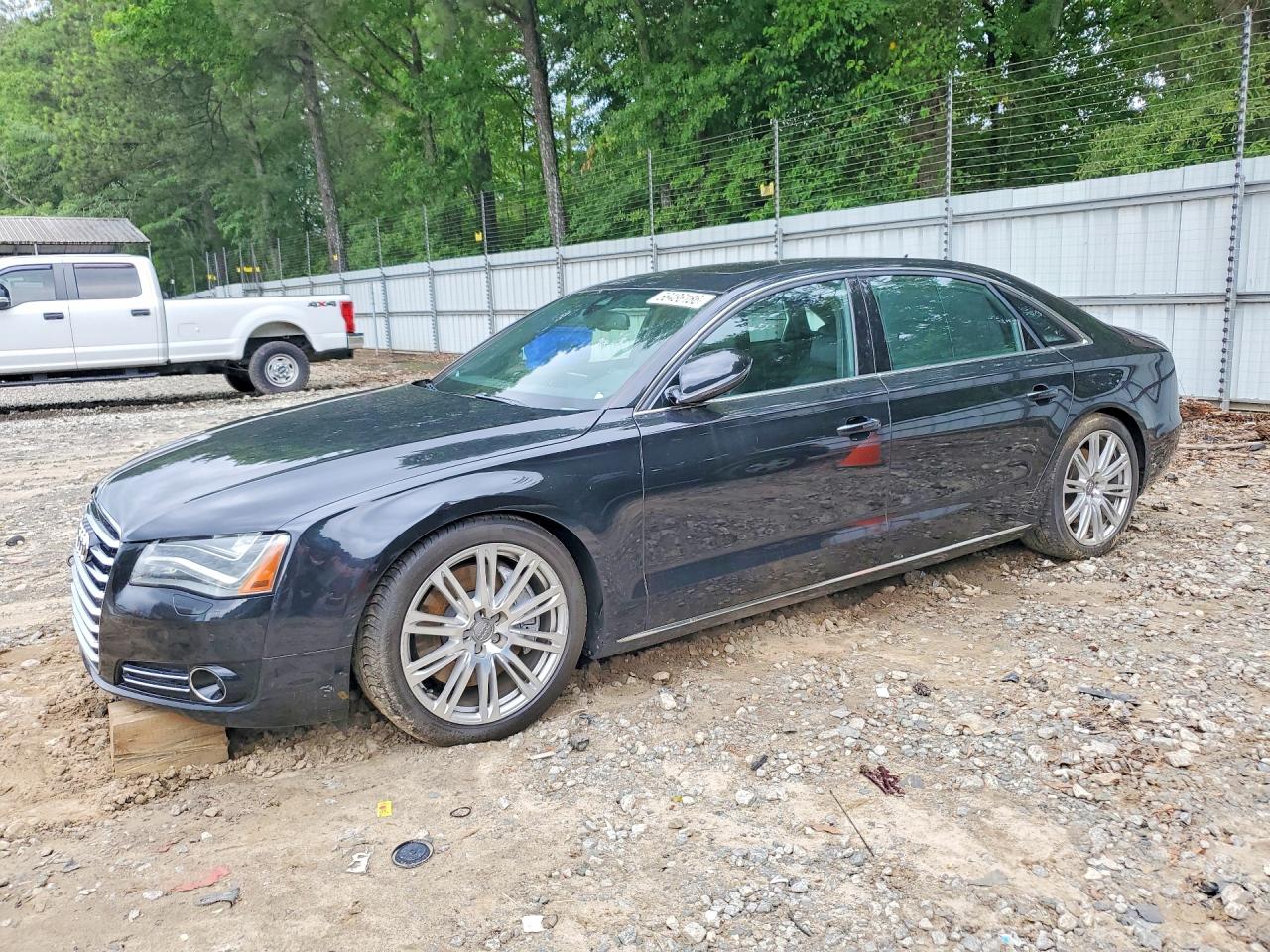 2011 Audi A8, VIN WAURVAFD1BN011312 — Undercarriage