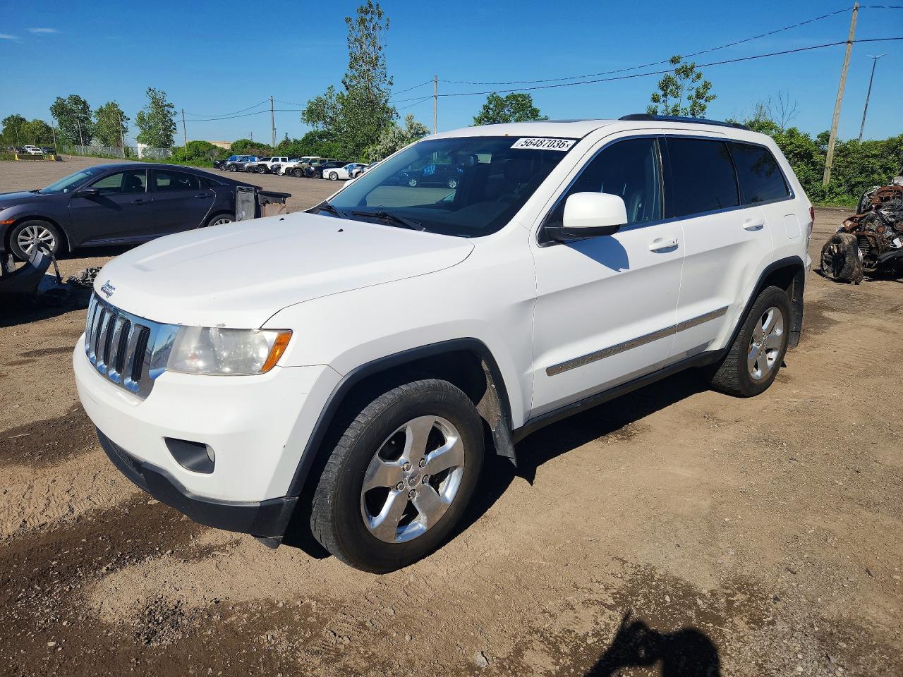 2013 Jeep Grand Cherokee Laredo, VIN 1C4RJFAG4DC531693 — Minor dents and scratches