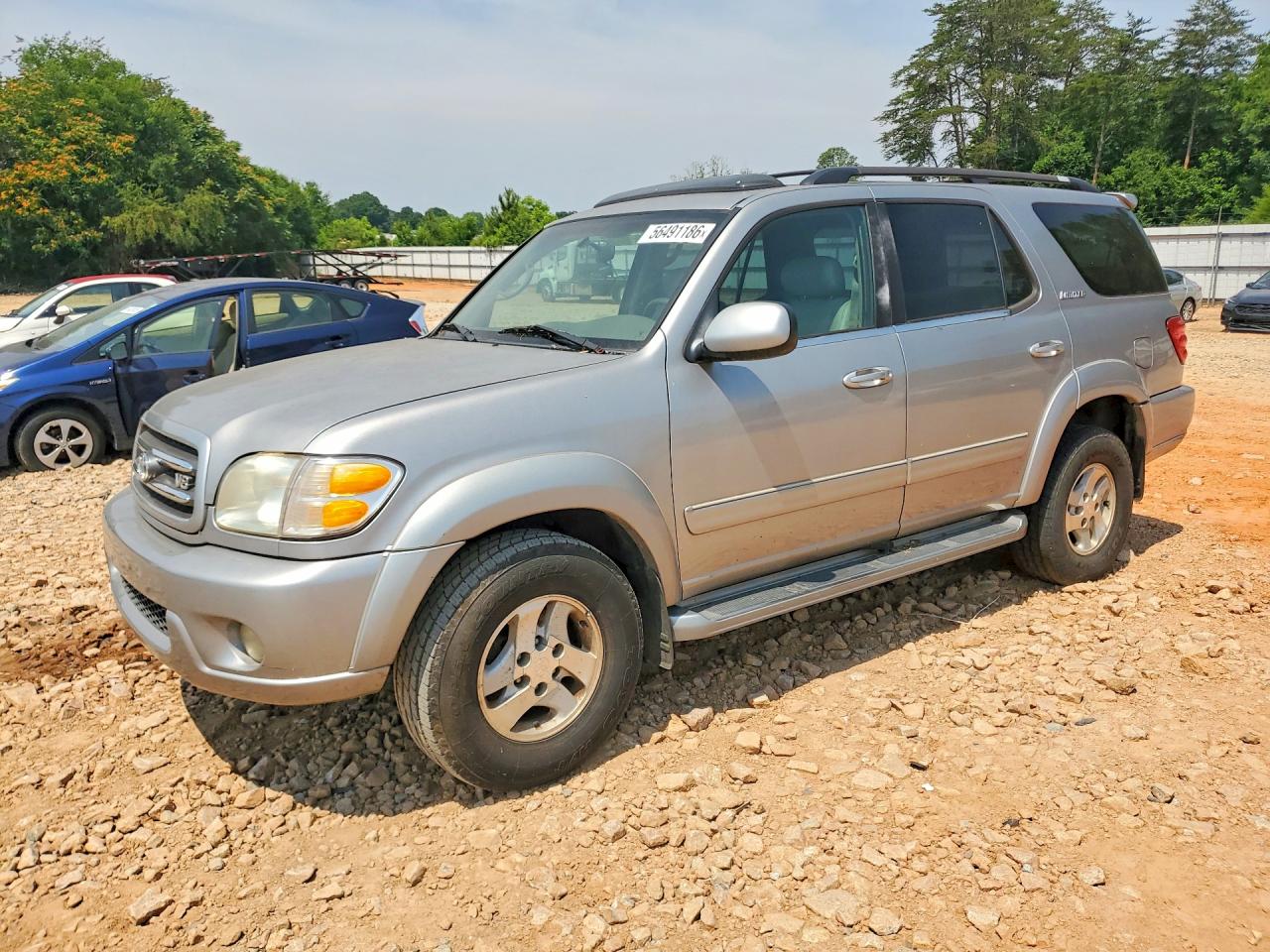2002 Toyota Sequoia Limited, VIN 5TDZT38A62S067389 — Ранее повреждён