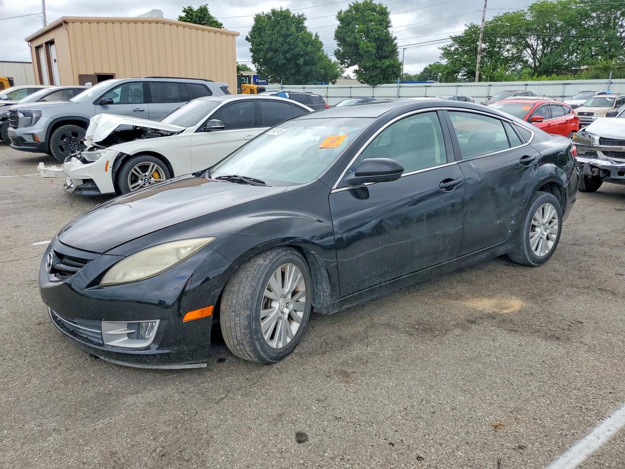 2009 Mazda 6 i Touring, VIN 1YVHP82H795M43773 — Перед
