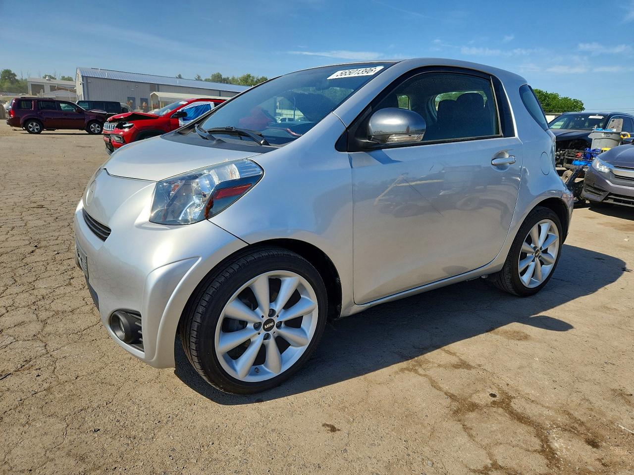 2014 Scion iQ 10 Series, VIN JTNJJXB00EJ029390 — Minor dents and scratches