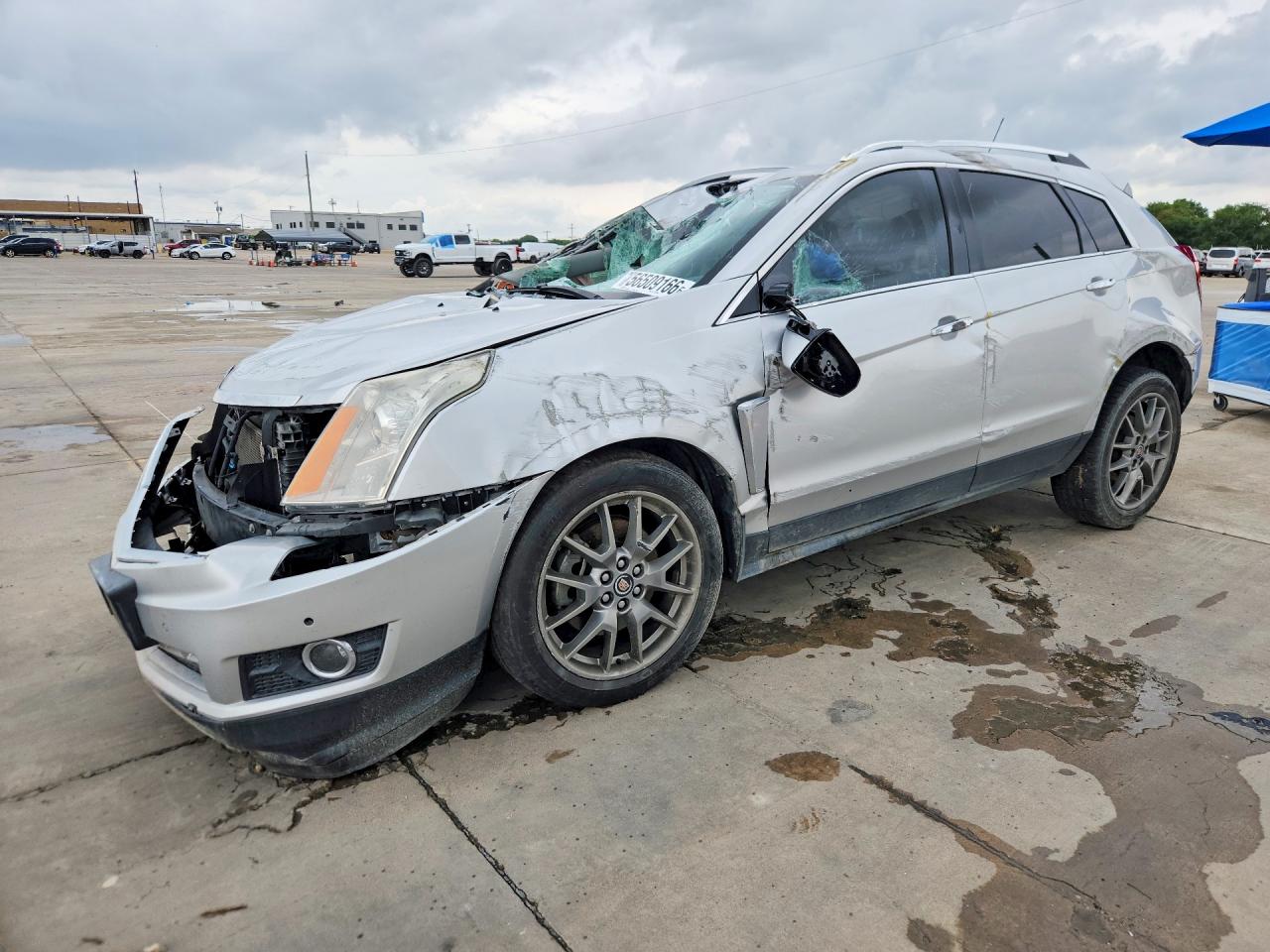 2015 Cadillac SRX Performance Collection, VIN 3GYFNCE37FS583534 — Rollover