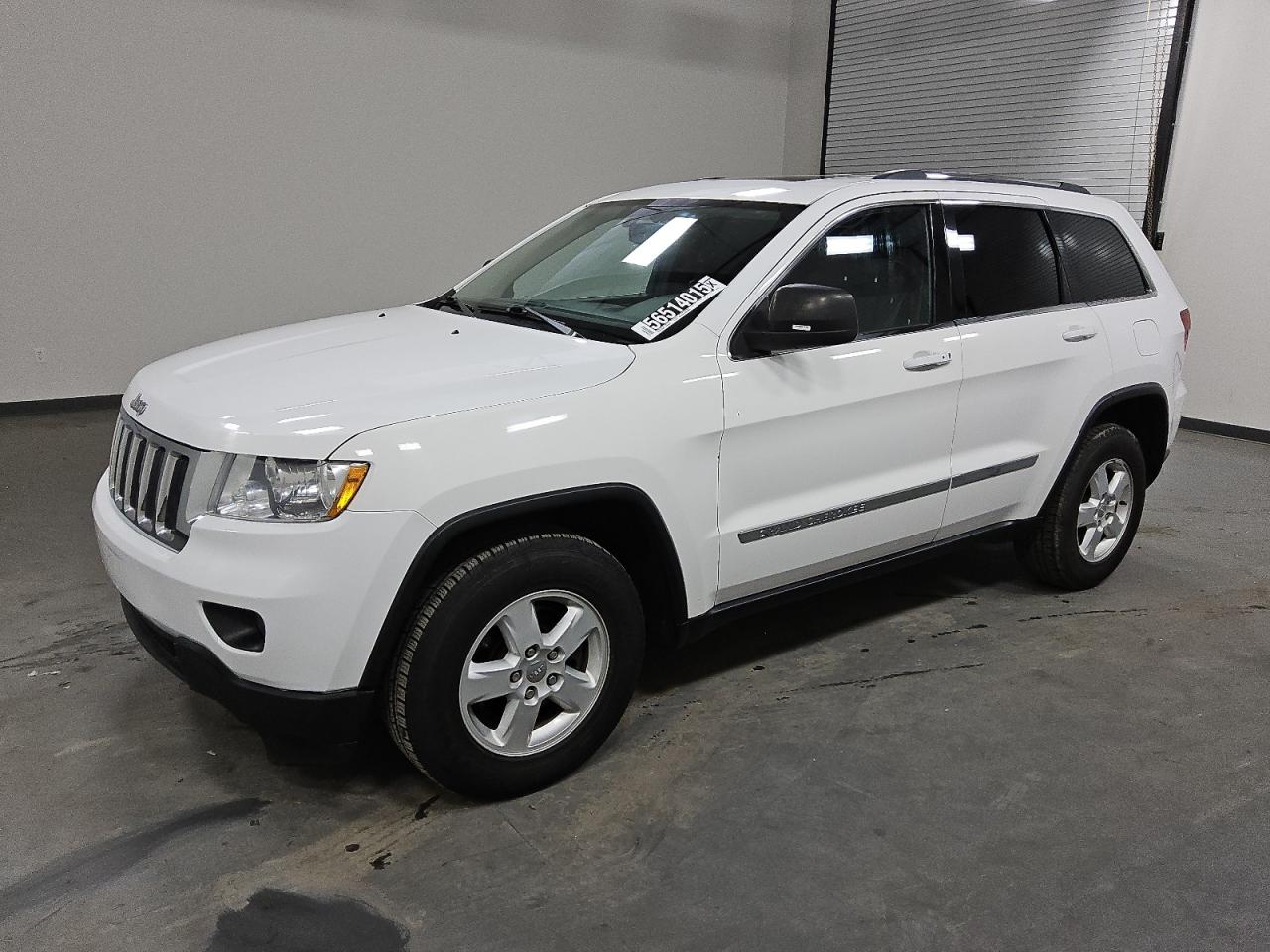 2013 Jeep Grand Cherokee Laredo, VIN 1C4RJFAG9DC542995 — Minor dents and scratches