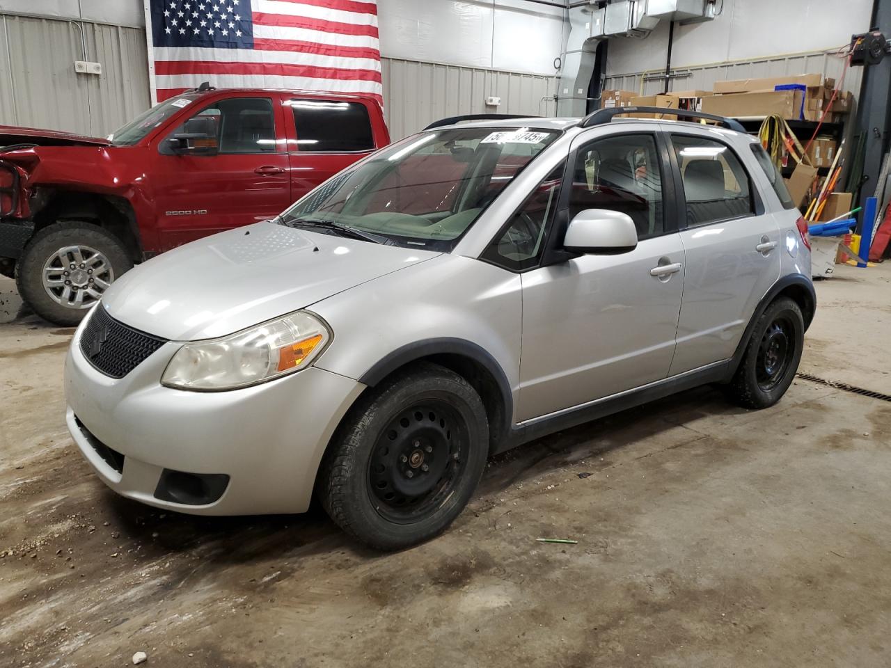 2011 Suzuki SX4 Crossover, VIN JS2YB5A31B6302809 — Механическое