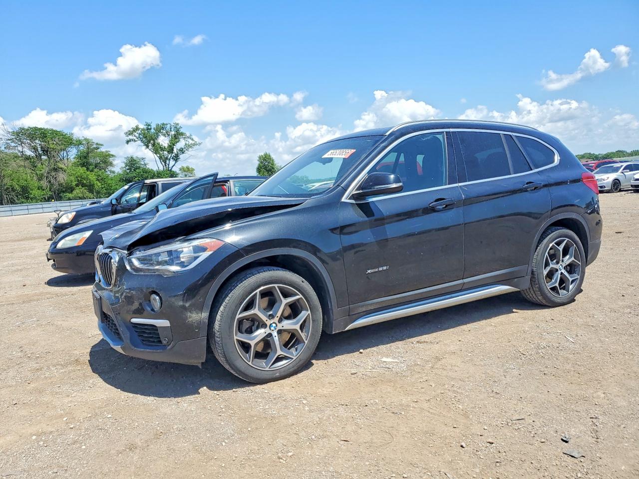 2016 BMW X1 xDrive28i, VIN WBXHT3C39G5E51769 — Front end