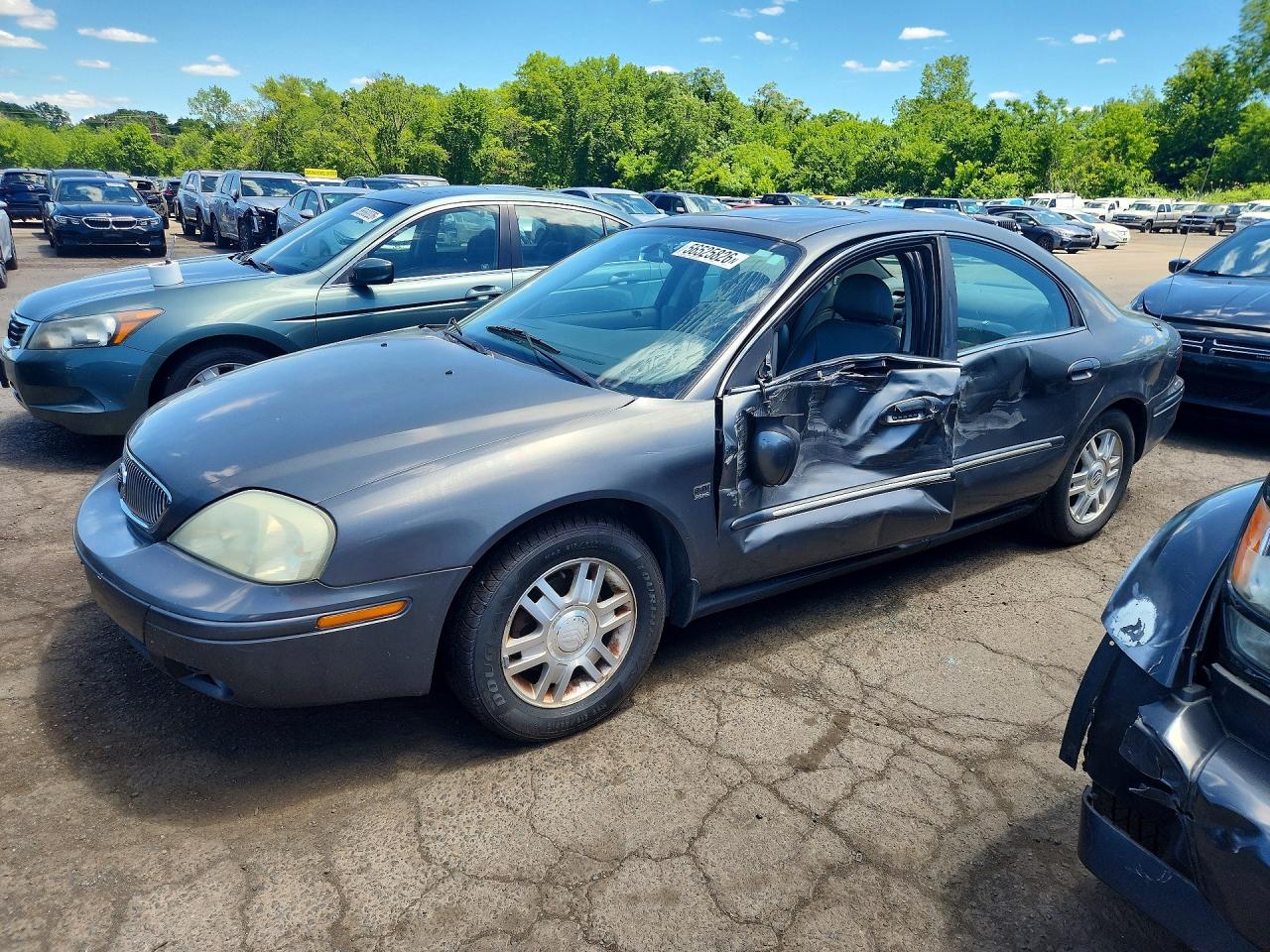 2004 Mercury Sable LS Premium, VIN 1MEFM55SX4G612174 — Side