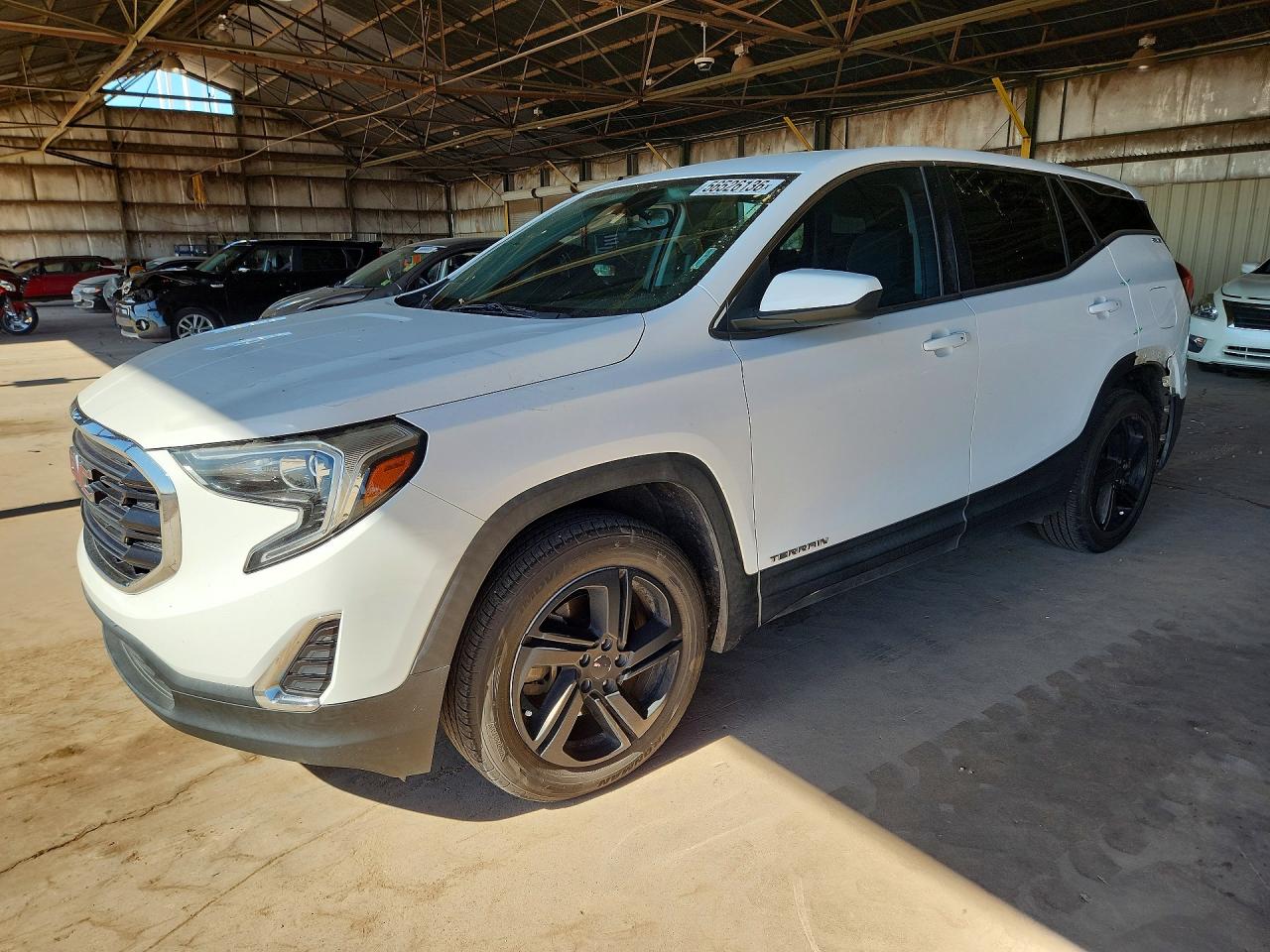 2018 GMC Terrain SLE, VIN 3GKALMEX5JL120359 — Зад