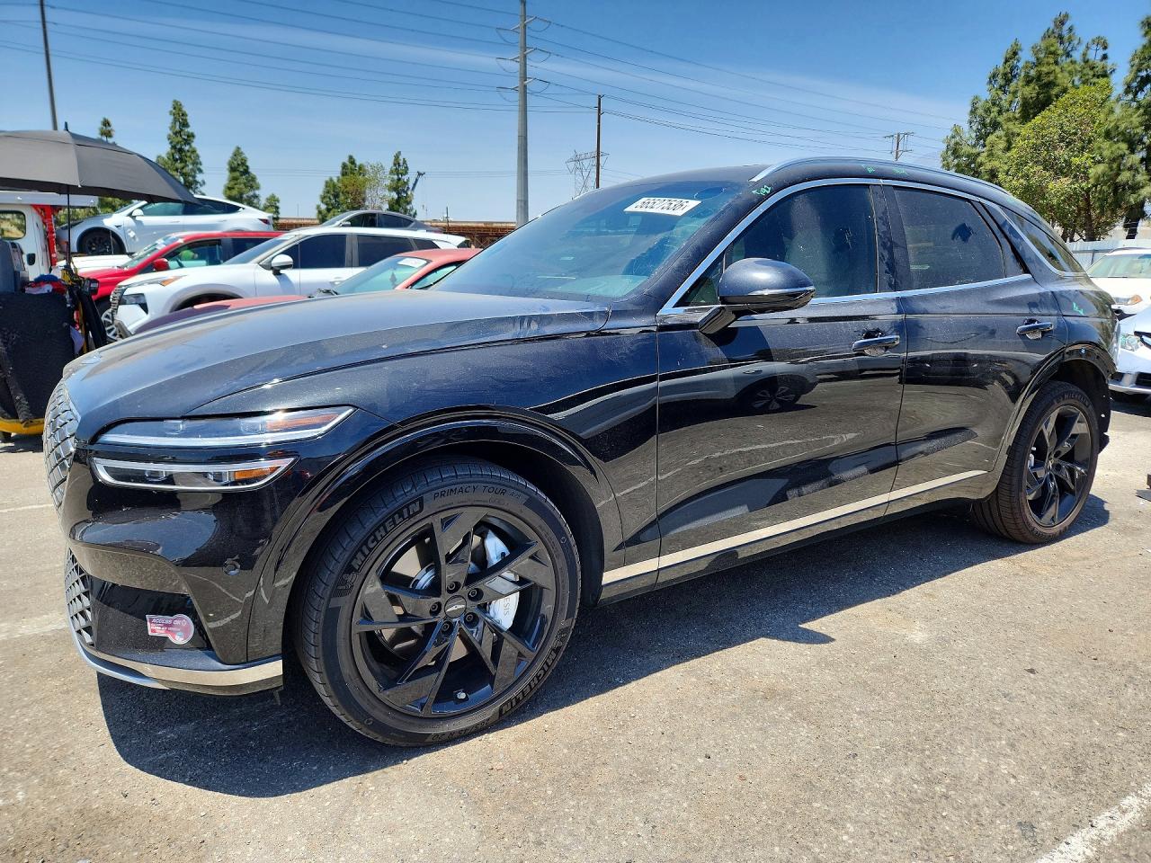 2024 Genesis GV70 Advanced, VIN 5NMMCET16RH002228 — Rear end