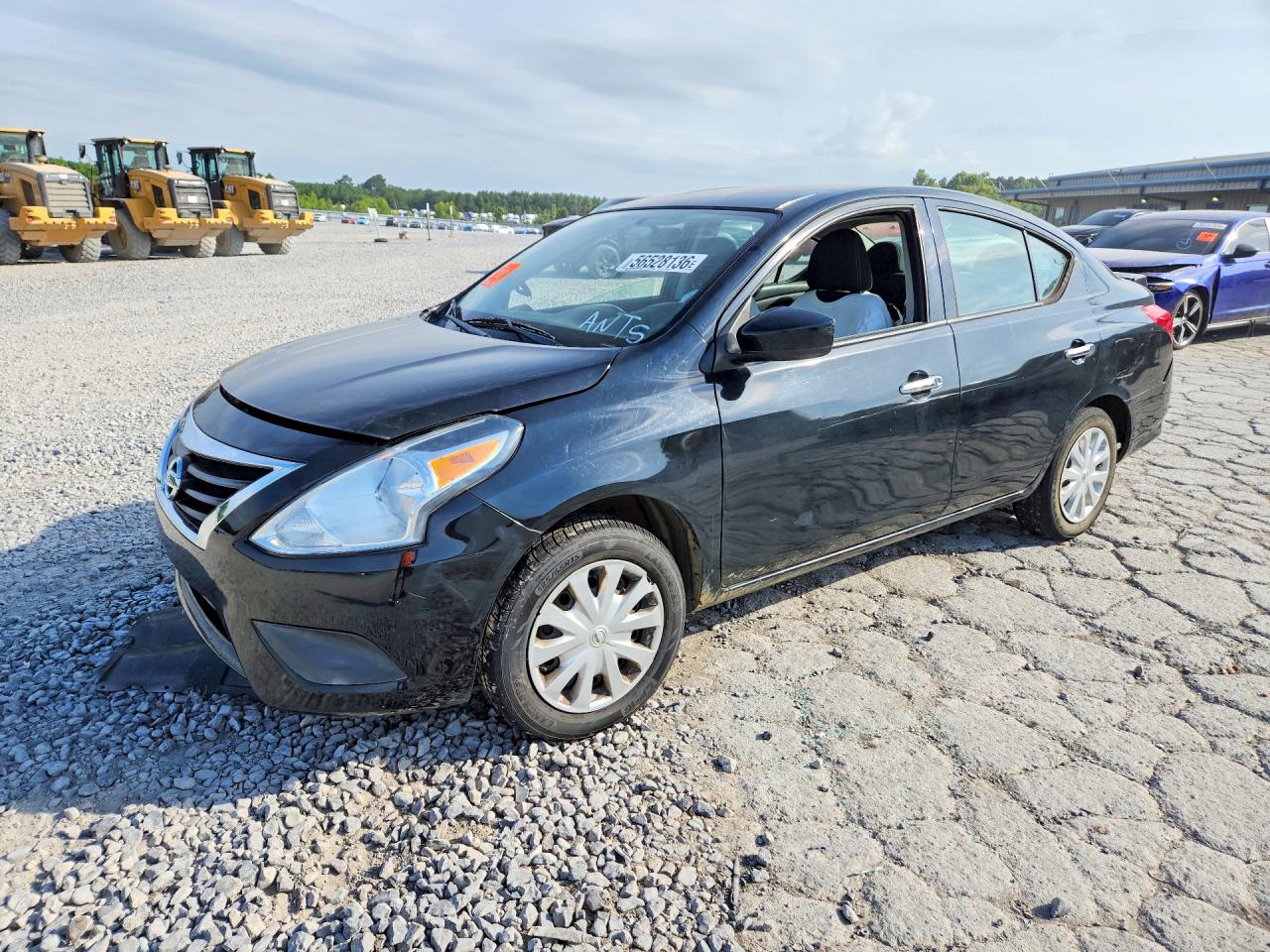 2017 Nissan Versa SV, VIN 3N1CN7AP3HL889171 — Бок