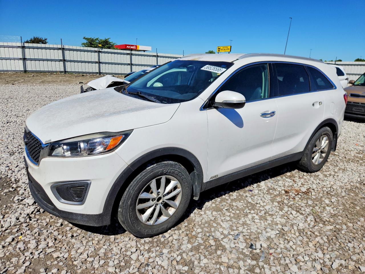 2017 Kia Sorento LX, VIN 5XYPGDA39HG275074 — Hail