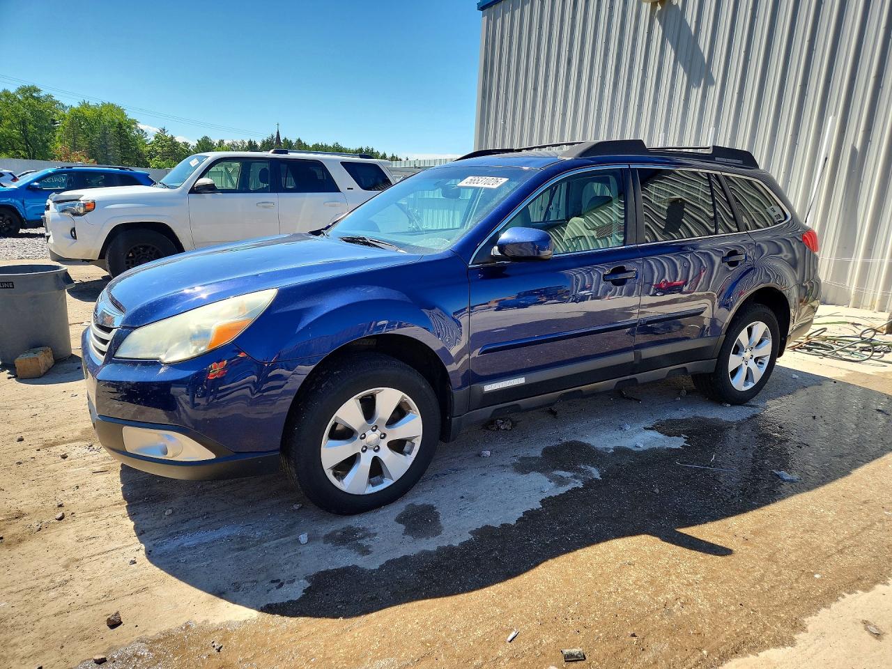 2011 Subaru Outback Premium, VIN 4S4BRBCC9B3420885 — Hail