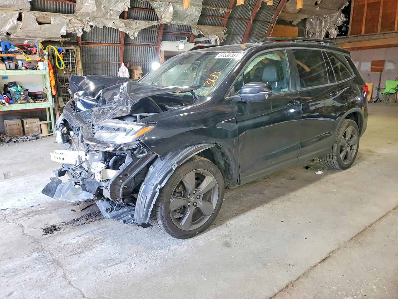 2019 Honda Passport Touring, VIN 5FNYF8H97KB027302 — Front end