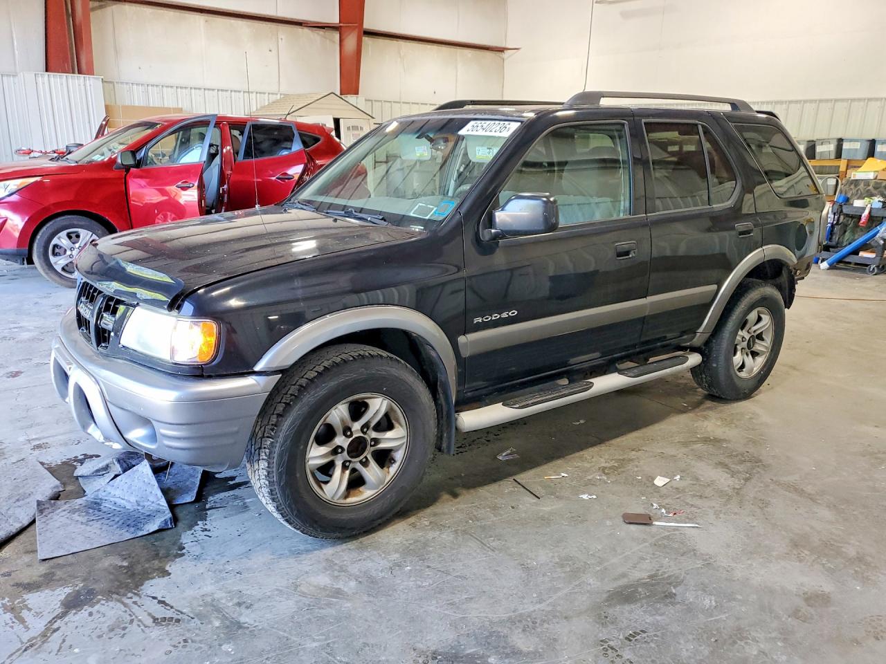 2003 Isuzu Rodeo, VIN 4S2CK58WX34311949 — Обычный износ