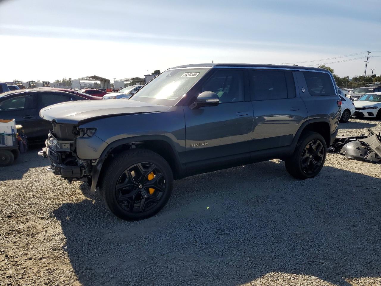 2023 Rivian R1S Adventure, VIN 7PDSGABA9PN010077 — Front end