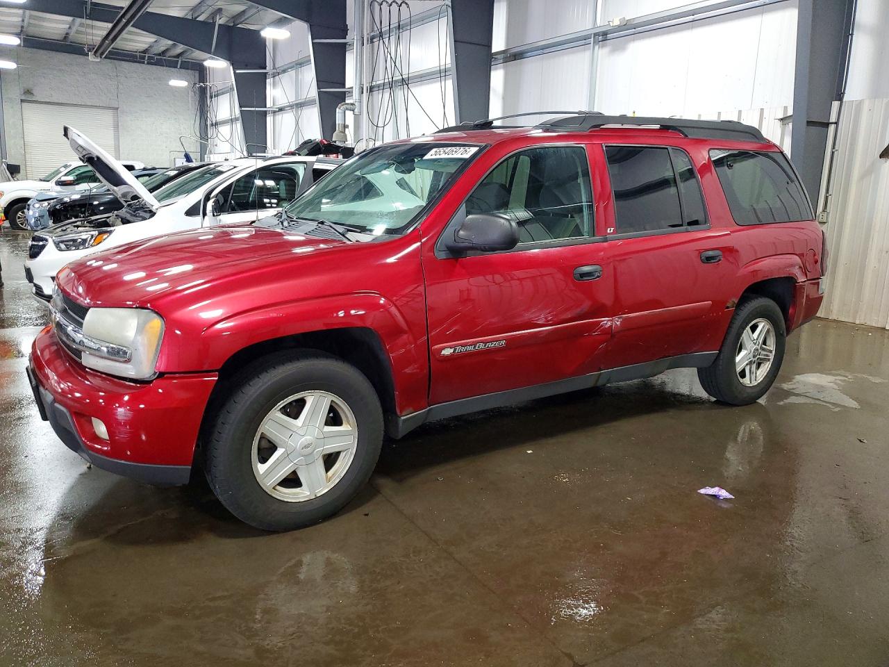 2003 Chevrolet TrailBlazer EXT LT, VIN 1GNET16S436101692 — Side