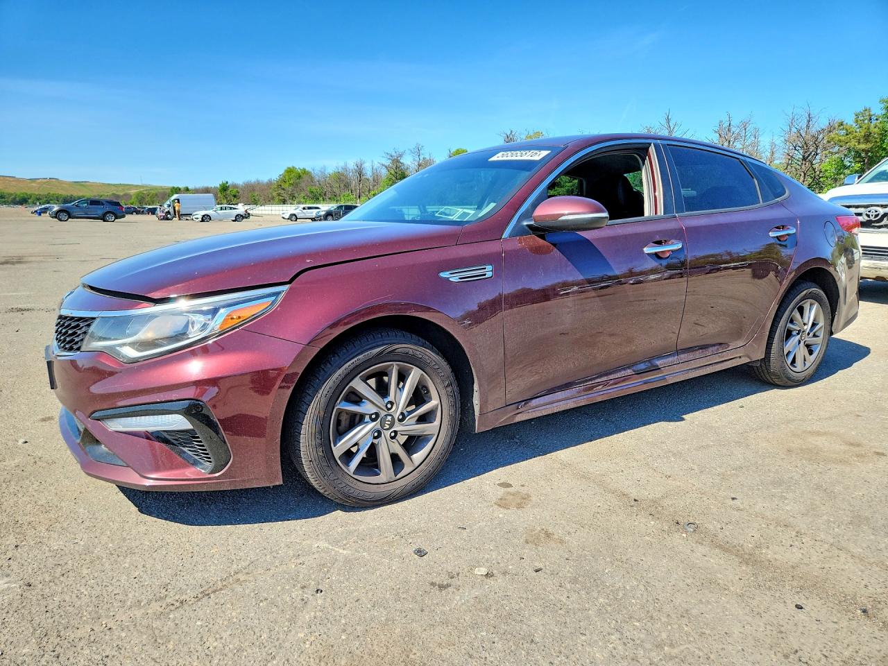2019 Kia Optima LX, VIN 5XXGT4L30KG365041 — Side