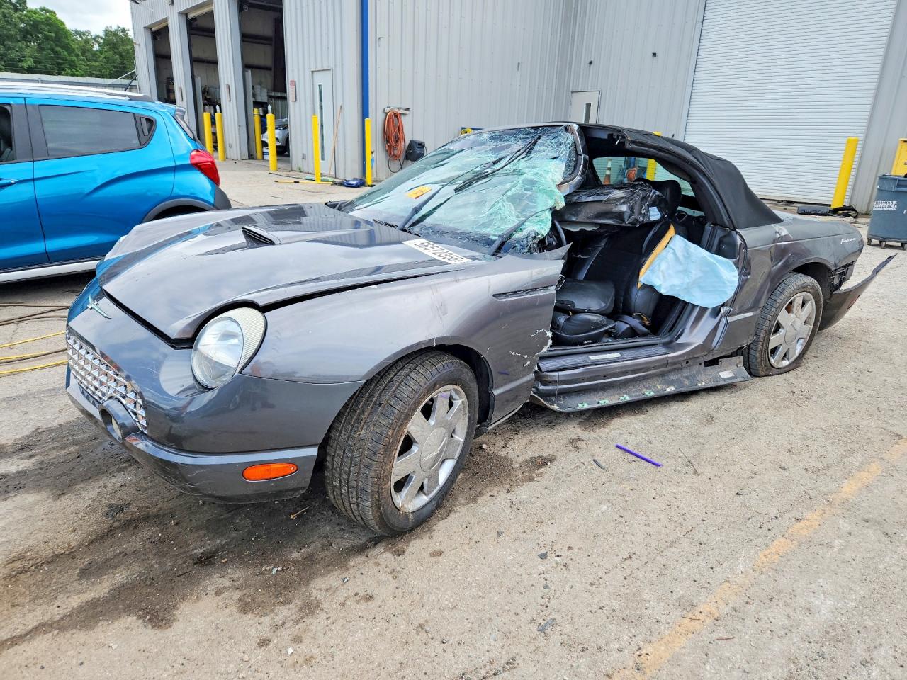 2003 Ford Thunderbird Deluxe, VIN 1FAHP60A03Y113582 — Side