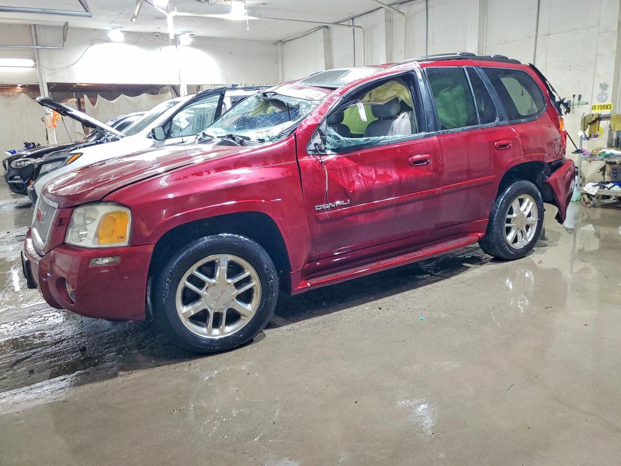 2009 GMC Envoy Denali, VIN 1GKET53M692112199 — Rollover
