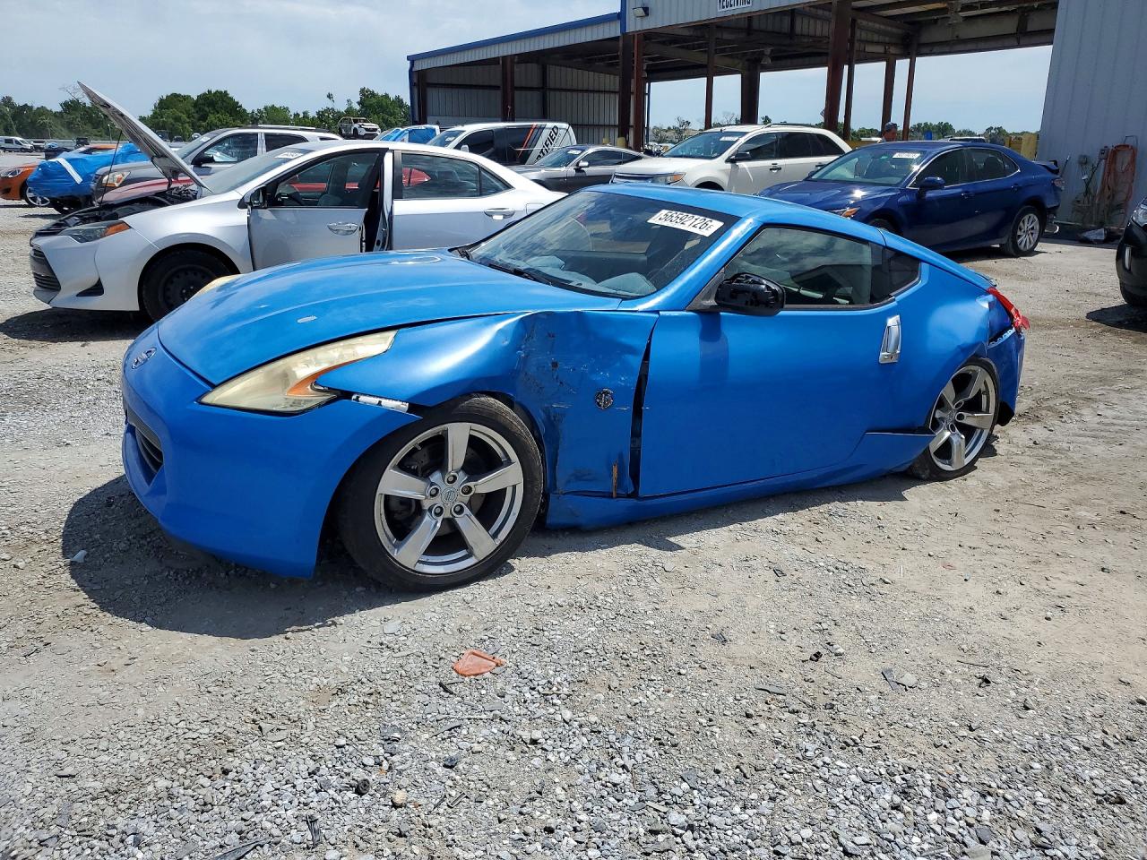 2009 Nissan 370Z, VIN JN1AZ44E99M408707 — Перед
