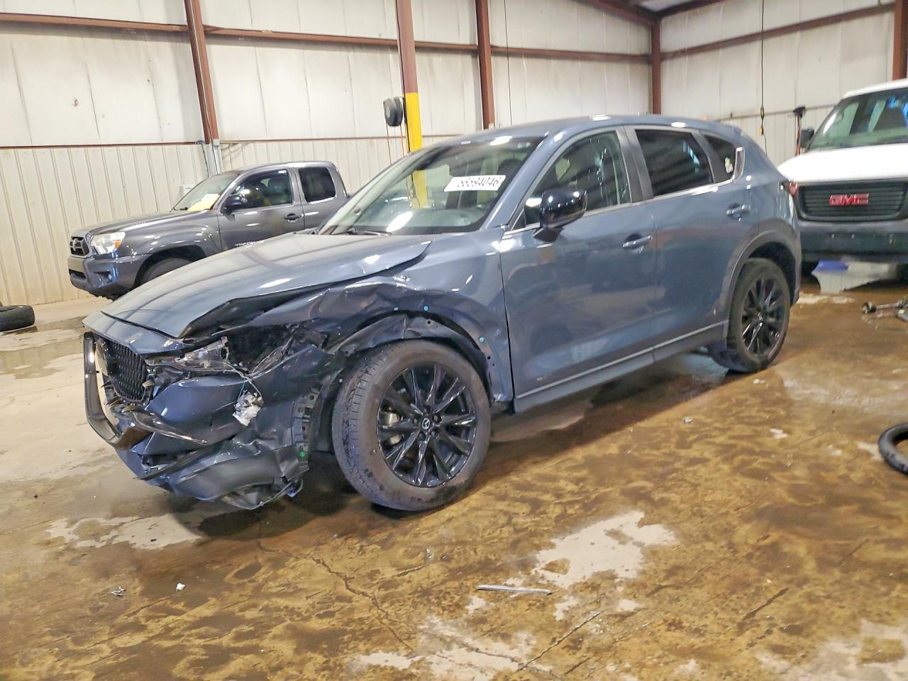 2021 Mazda CX-5 Touring, VIN JM3KFBCM6M0441260 — Front end
