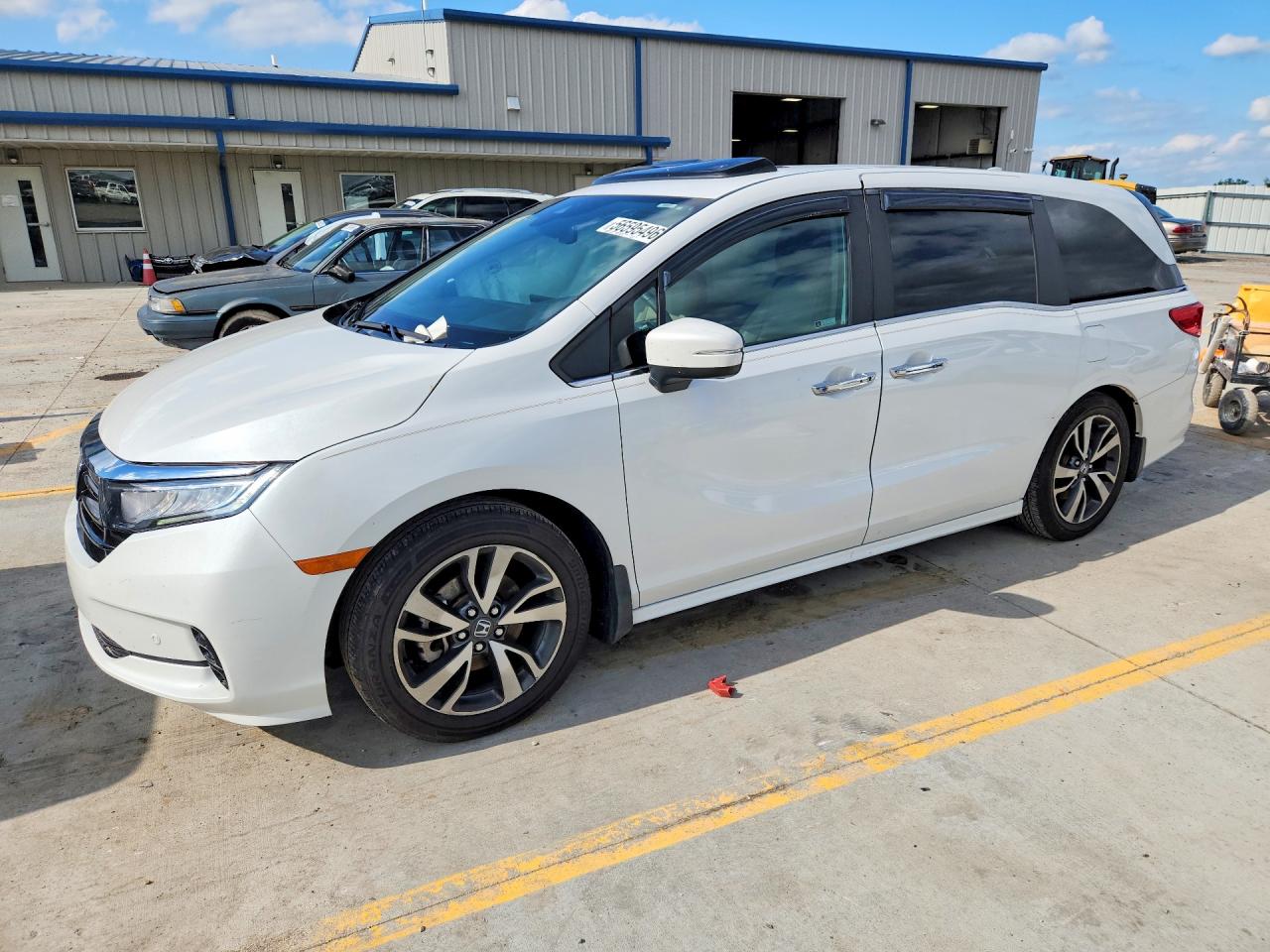 2021 Honda Odyssey Touring, VIN 5FNRL6H85MB002474 — Side