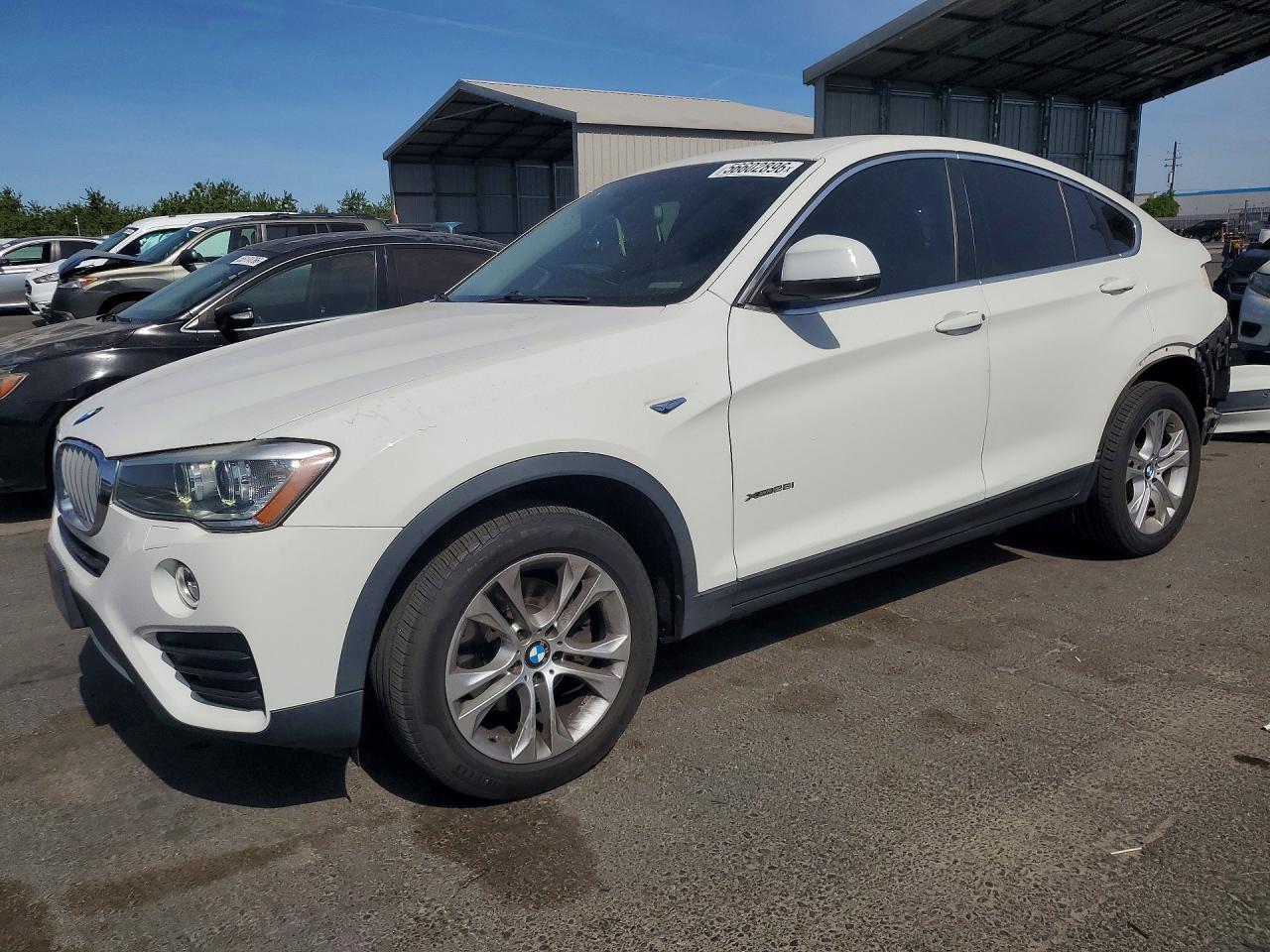 2015 BMW X4 xDrive28i, VIN 5UXXW3C54F0F89201 — Rear end