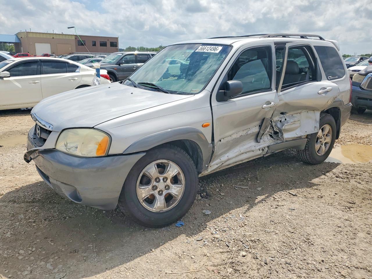 2002 Mazda Tribute LX, VIN 4F2YU09152KM61530 — Side