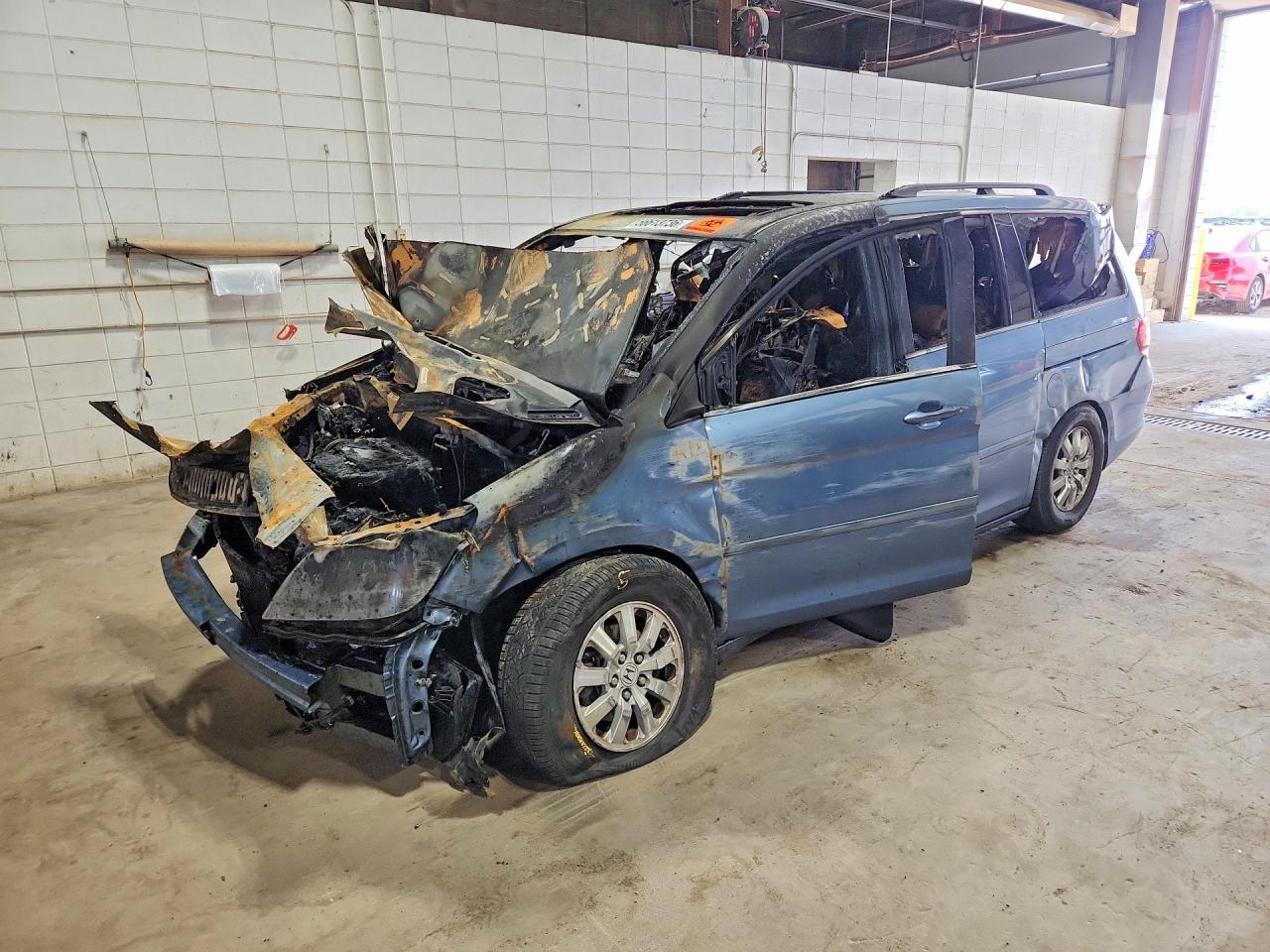 2010 Honda Odyssey EX-L, VIN 5FNRL3H64AB014995 — Interior fire
