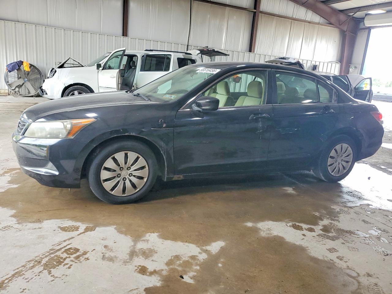 2009 Honda Accord LX, VIN 1HGCP26309A029304 — Undercarriage