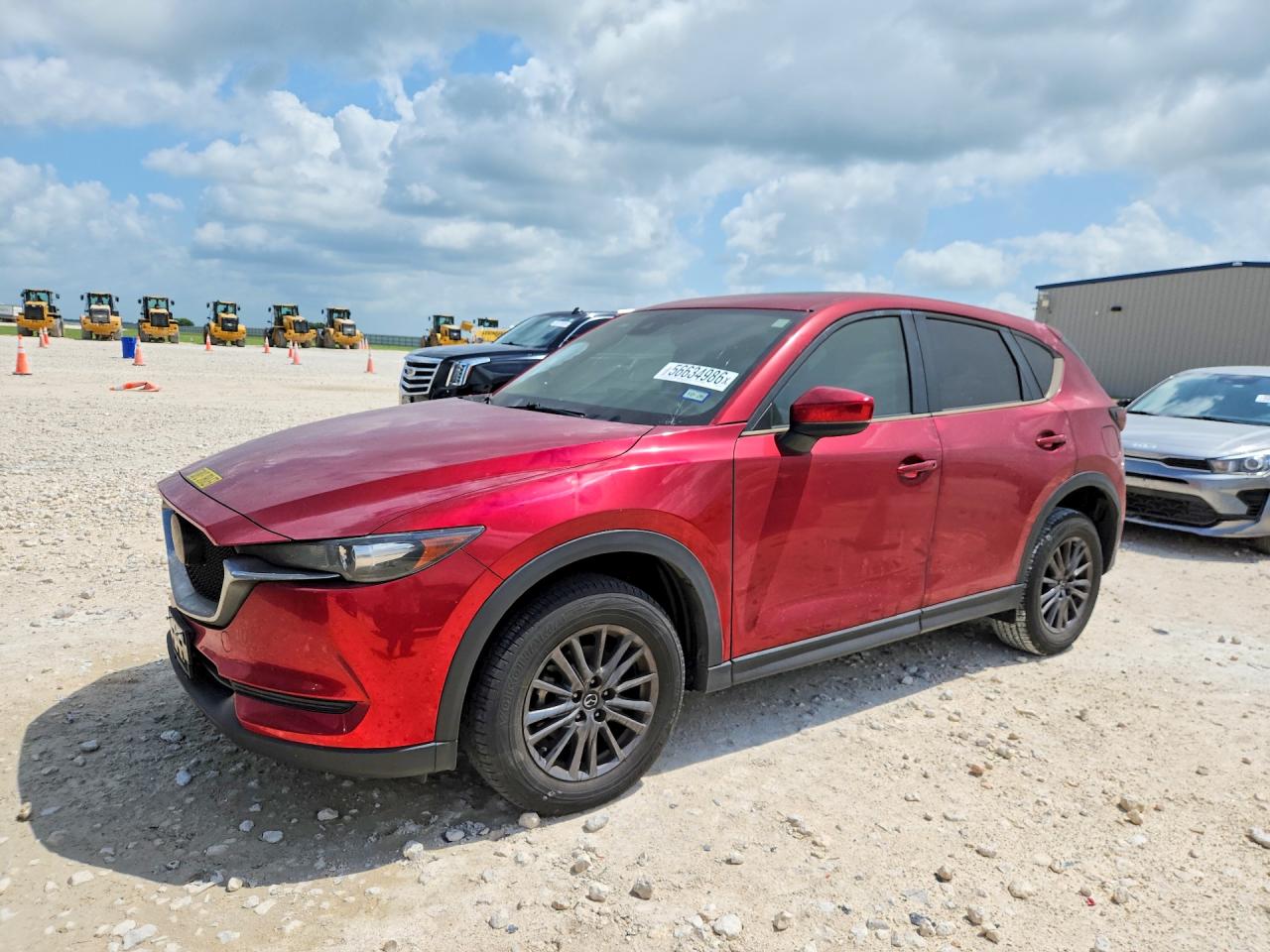 2020 Mazda CX-5 Touring, VIN JM3KFACM4L0857042 — Burn