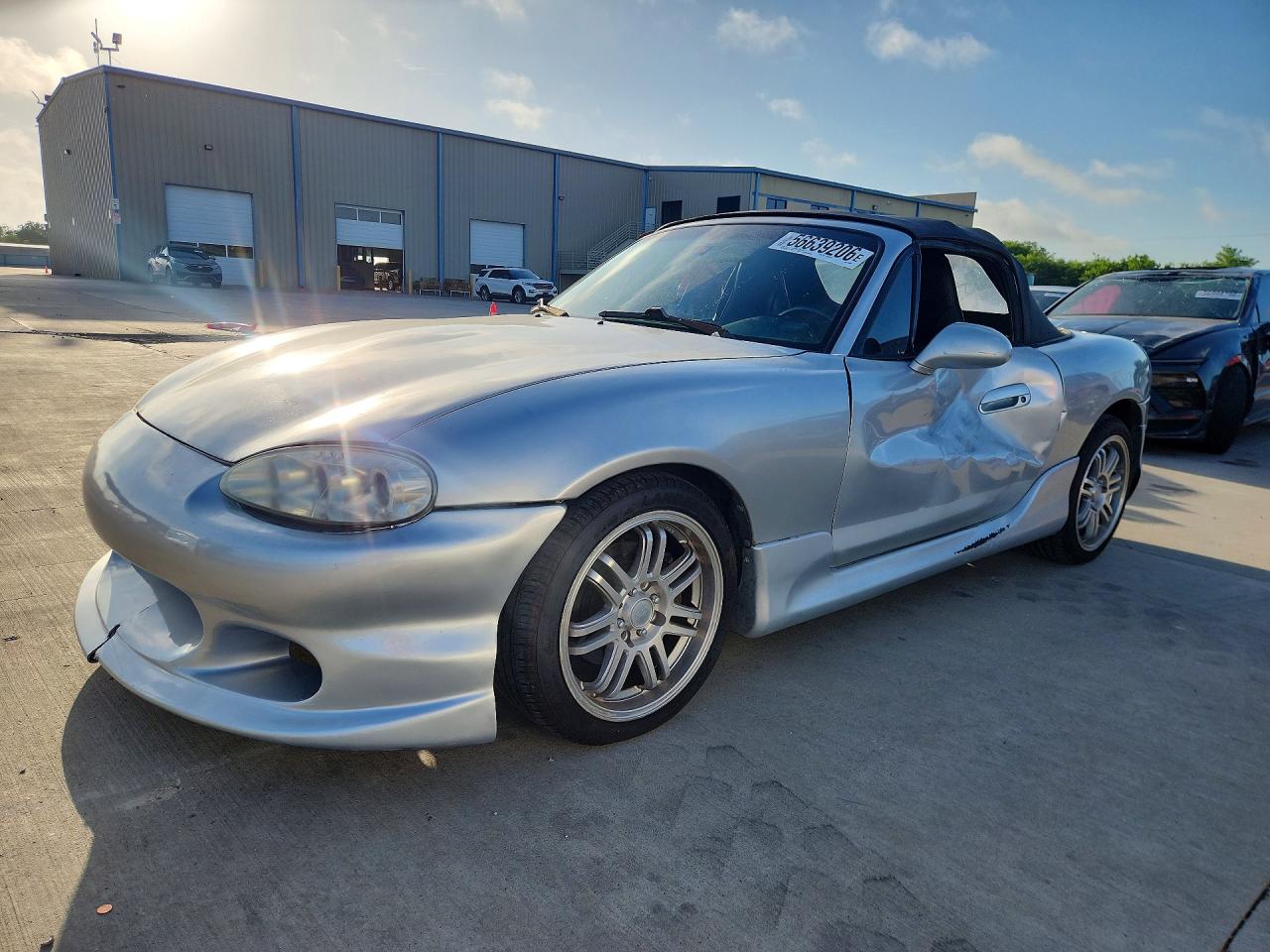 2004 Mazda MX-5 Miata Cloth, VIN JM1NB353440408088 — Side