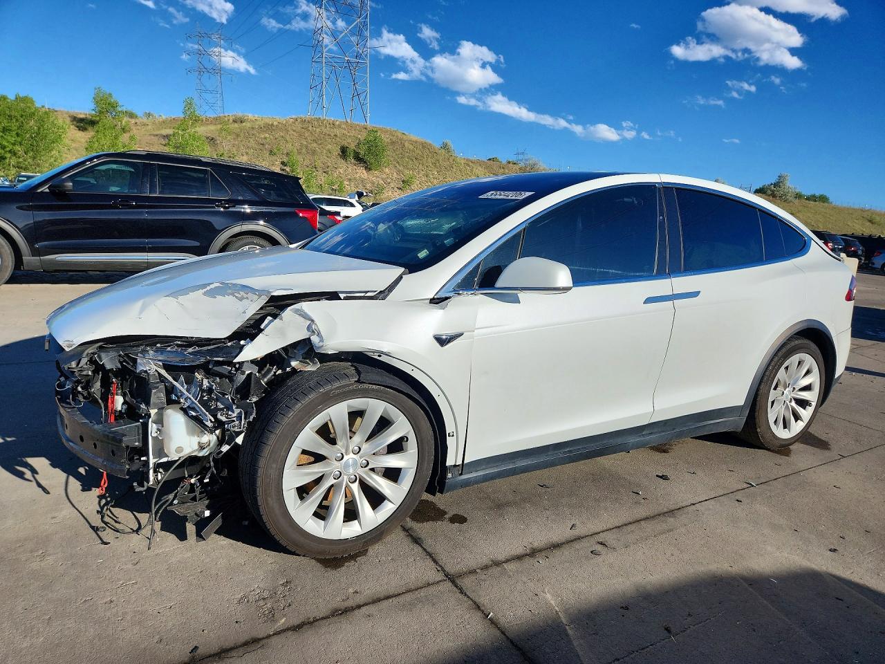 2017 Tesla Model X 90D, VIN 5YJXCBE22HF044722 — Зад