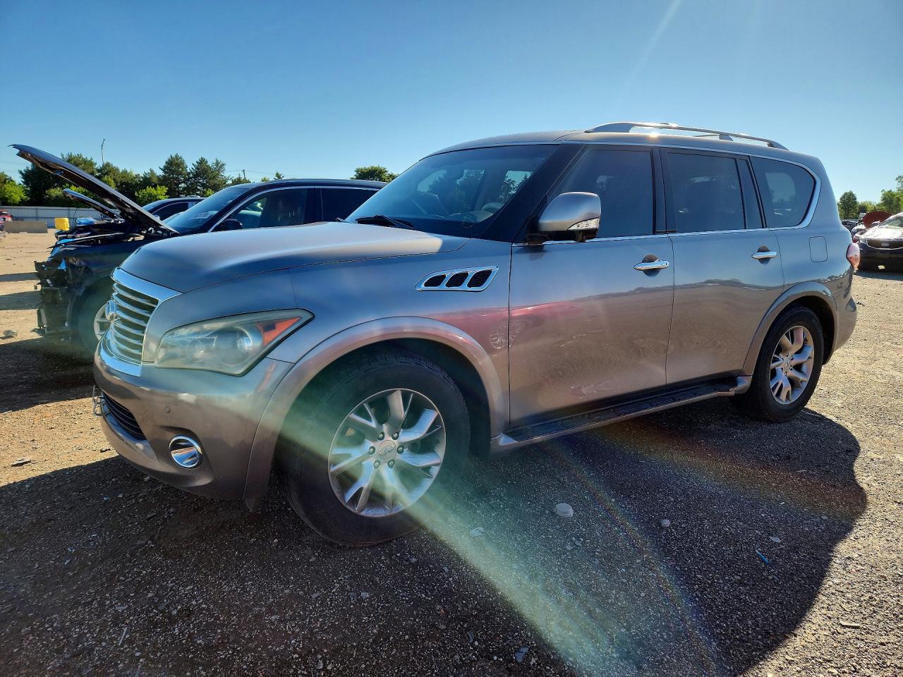 2012 Infiniti QX56 7-passenger, VIN JN8AZ2NEXC9017113 — Hail