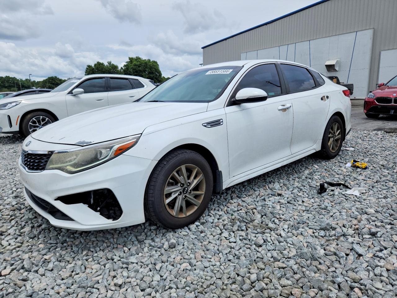 2019 Kia Optima LX, VIN 5XXGT4L37KG320405 — Side