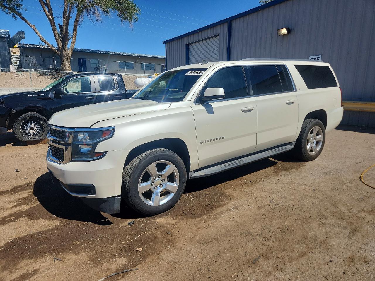 2015 Chevrolet Suburban LT, VIN 1GNSCJKC2FR303807 — Rear end