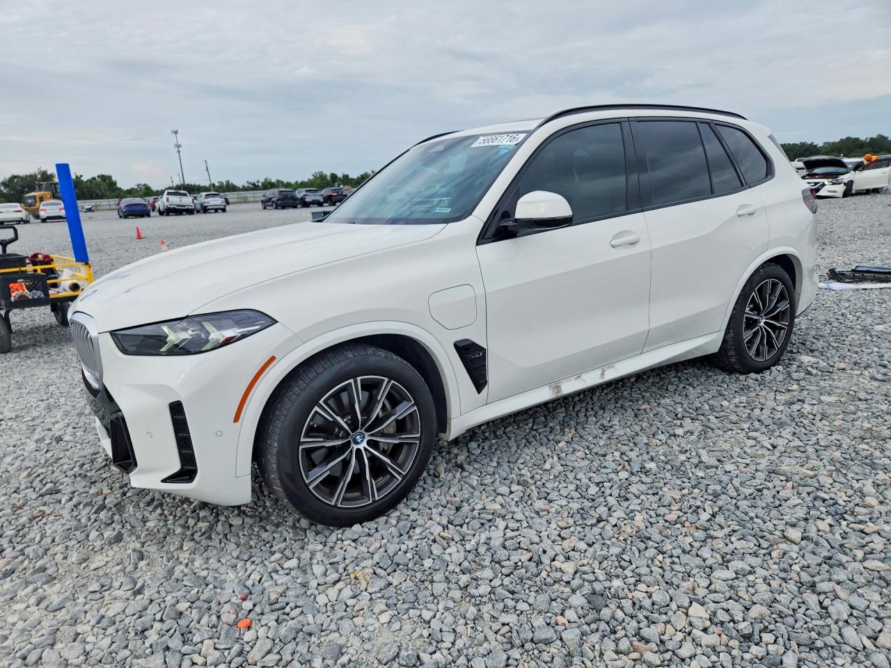 2024 BMW X5 xDrive50e, VIN 5UX43EU09R9T25625 — Side