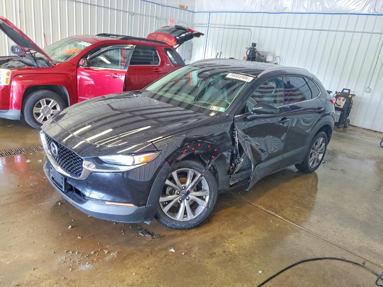 2024 Mazda CX-30 S Premium, VIN 3MVDMBDM9RM664286 — Front end
