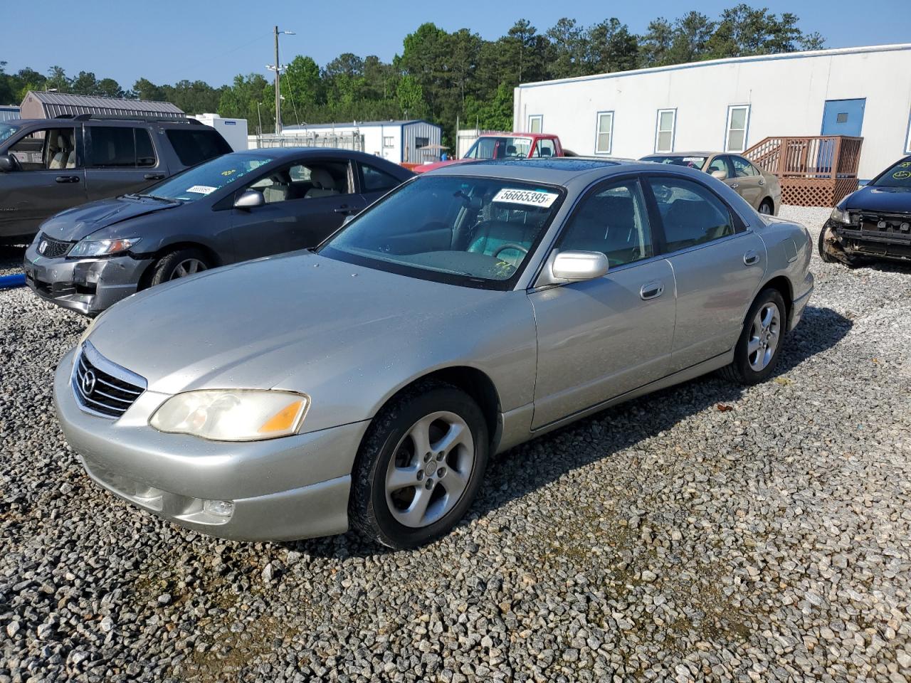 2002 Mazda Millenia P, VIN JM1TA221321733412 — Side