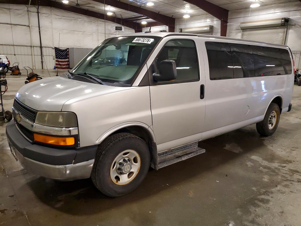 2011 Chevrolet Express Passenger 1LT, VIN 1GAZG1FG1B1127939 — Side