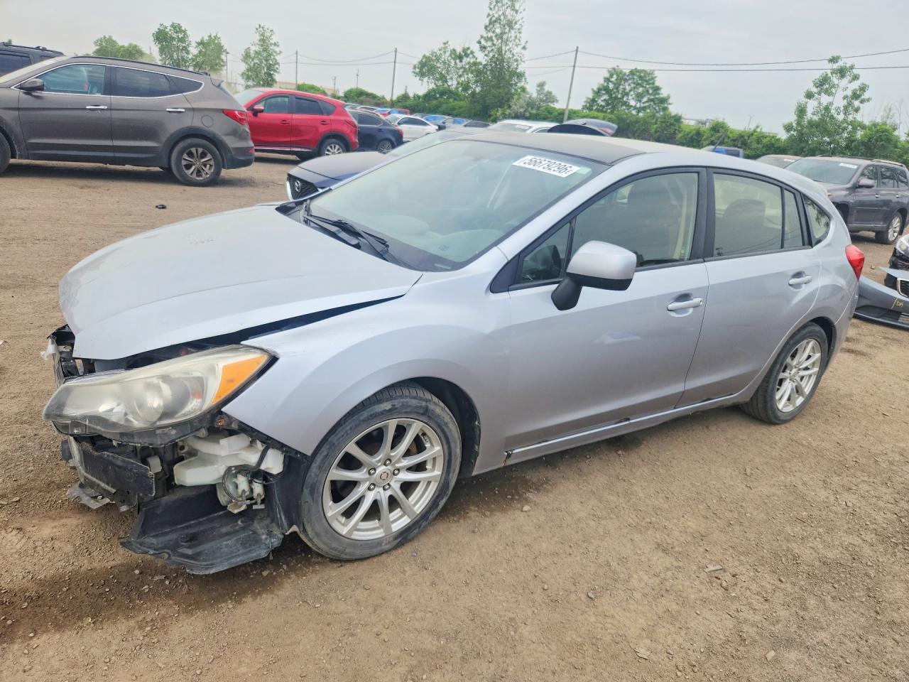 2013 Subaru Impreza 2.0i, VIN JF1GPAA64DH208656 — Front end