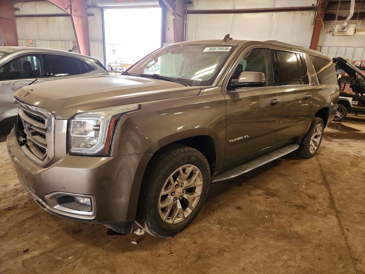 2016 GMC Yukon XL SLE, VIN 1GKS2FKC5GR172144 — Front end