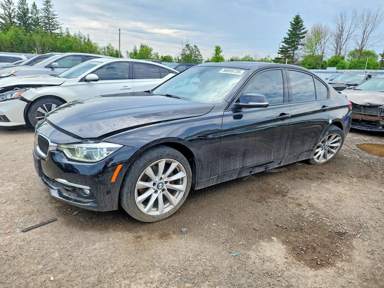 2017 BMW 3 Series 330i xDrive, VIN WBA8D9G32HNU63734 — Side