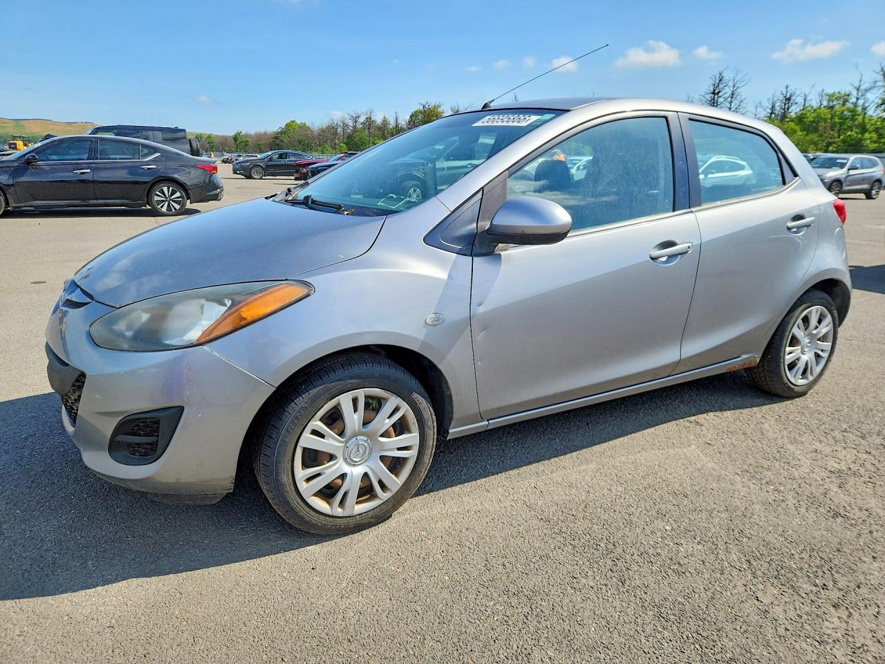 2014 Mazda 2 Sport, VIN JM1DE1KZXE0185119 — Minor dents and scratches