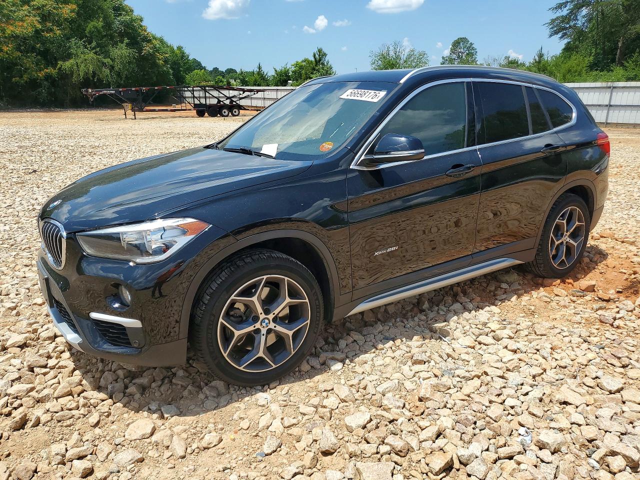 2018 BMW X1 xDrive28i, VIN WBXHT3Z30J4A66556 — Burn