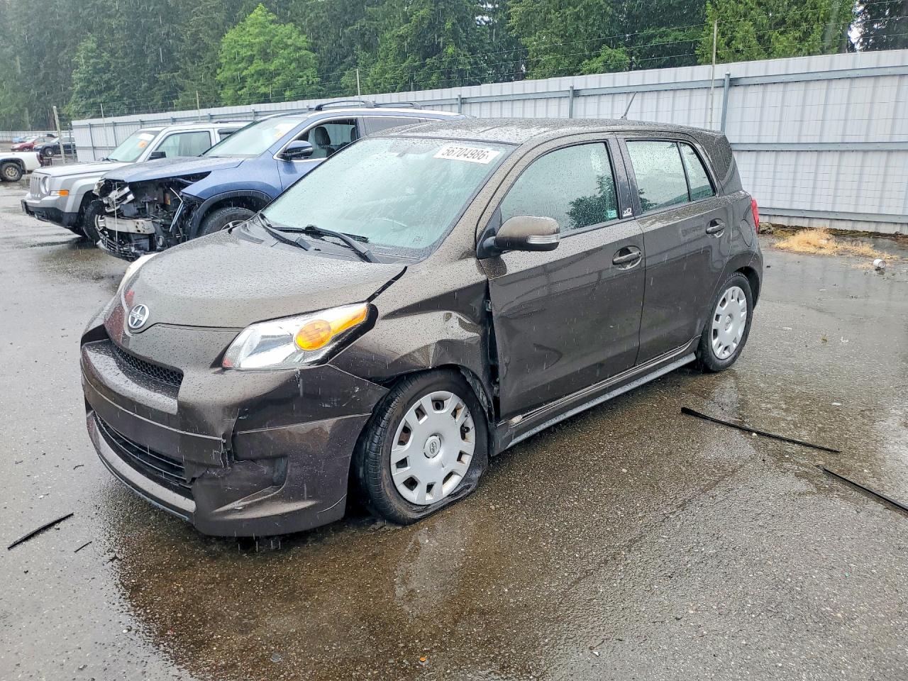 2011 Scion xD, VIN JTKKU4B46B1009554 — Перед