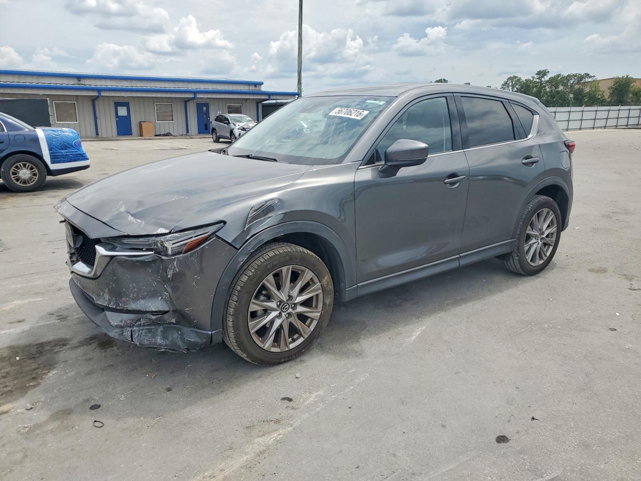 2021 Mazda CX-5 Grand Touring, VIN JM3KFBDM8M0464182 — Front end