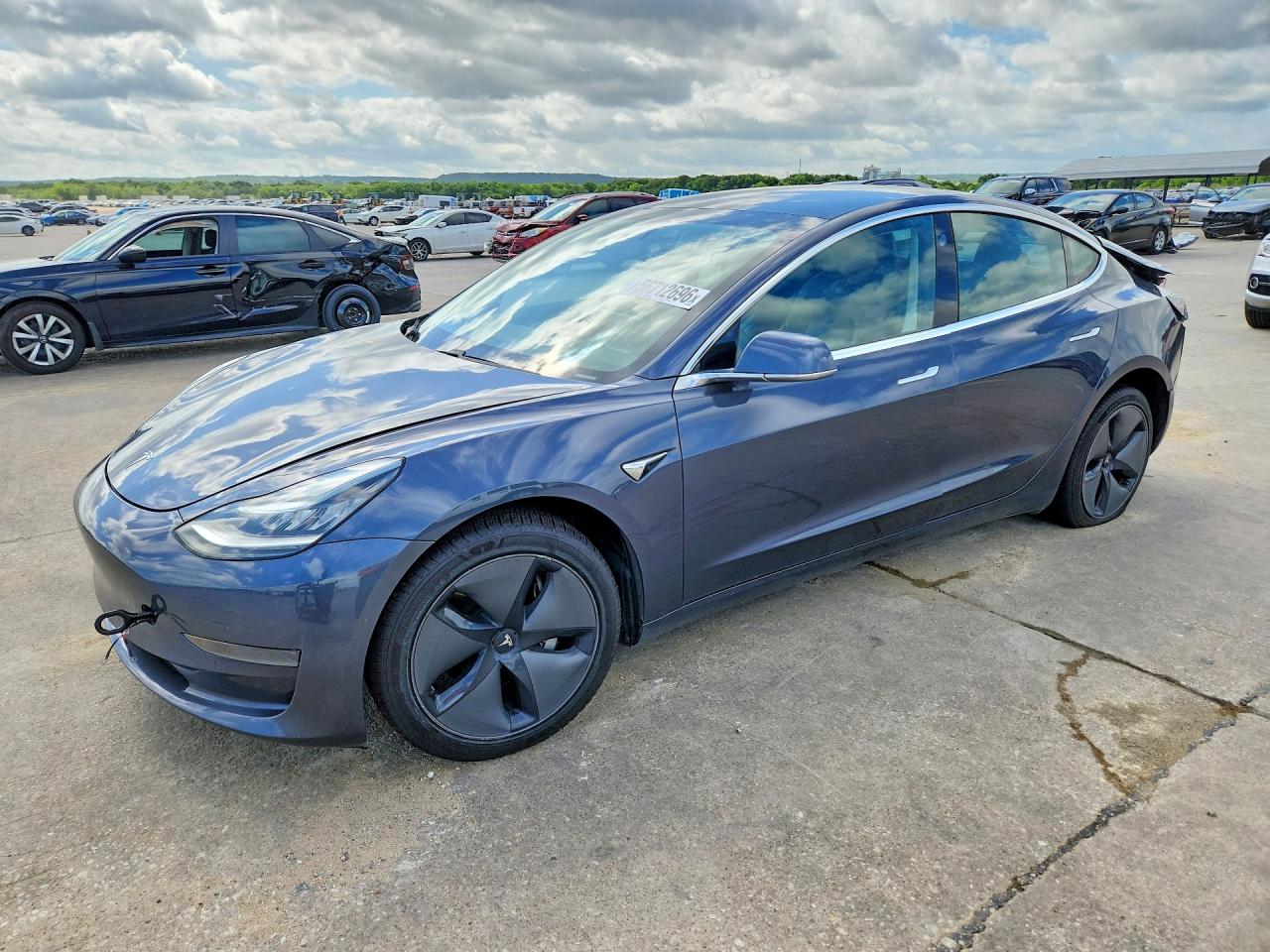 2020 Tesla Model 3 Standard Range Plus, VIN 5YJ3E1EA7LF705177 — Зад